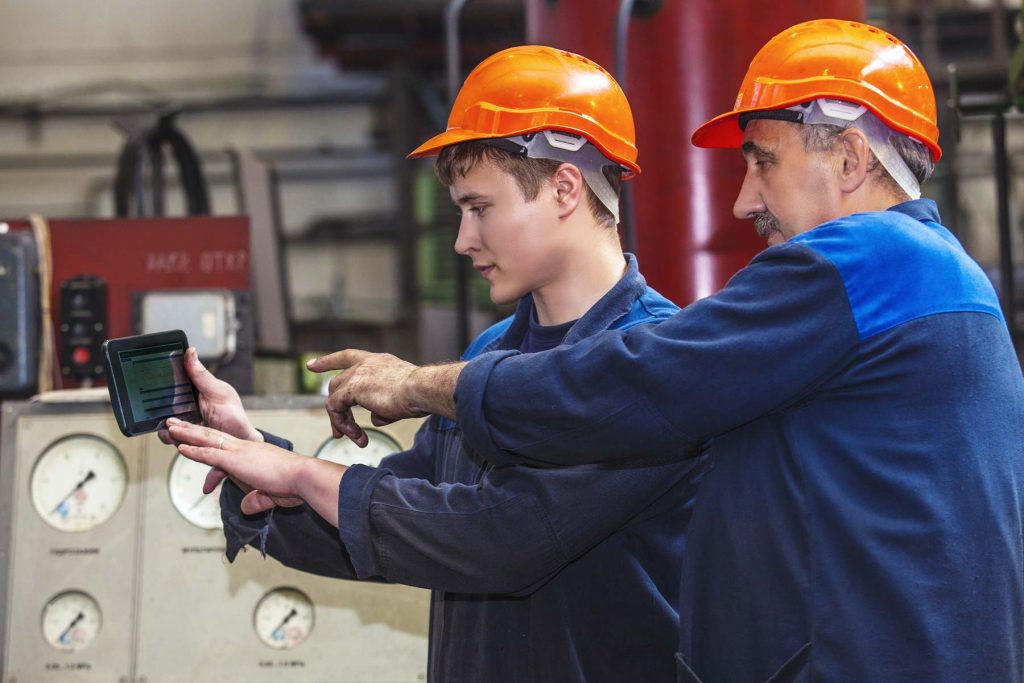 engineer checking machinery