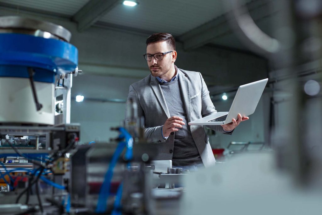 engineer checking machinery